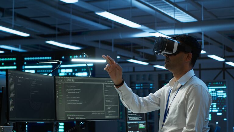 Engineer wearing VR headset in data center installing software